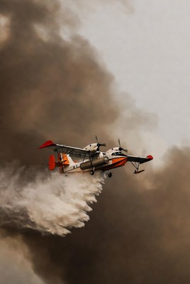 Firefighting Seaplane Dropping Water