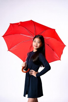 Asian girl holding red umbrella