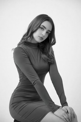 Young woman in turtleneck dress