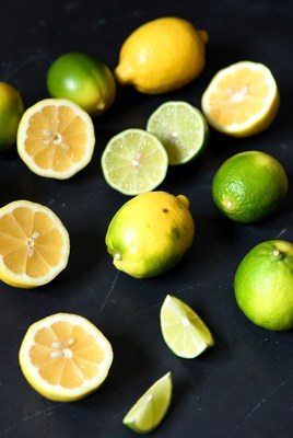 Lemons and Limes on Black Background