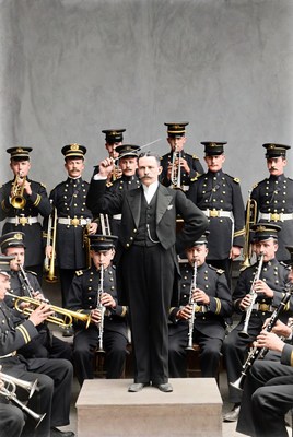 Conductor leading military band