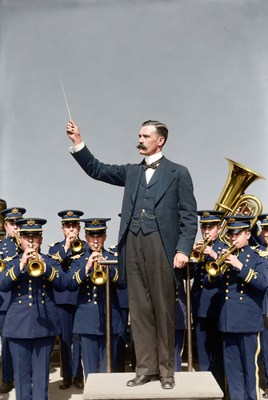 Conductor leading navy band