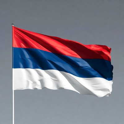 Serbian flag waving on pole