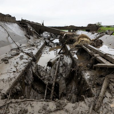 Destroyed Flooded Bridge Debris
