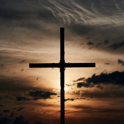 Silhouette Cross at Sunset