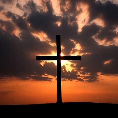 Silhouette Cross at Sunset