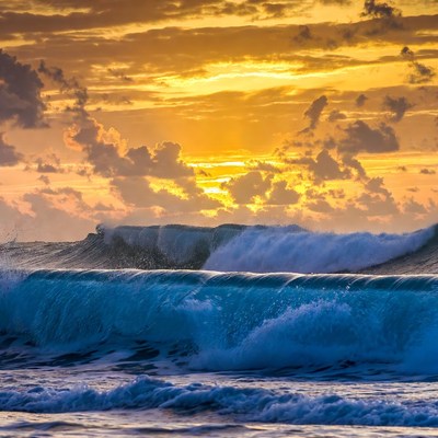Ocean Waves Crashing at Sunset