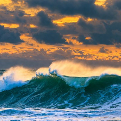 Massive Ocean Wave Crashing at Sunset