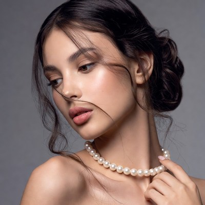 Woman wearing pearl necklace