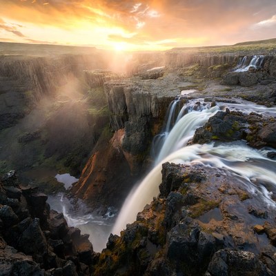 Waterfalls in Canyon at Sunset