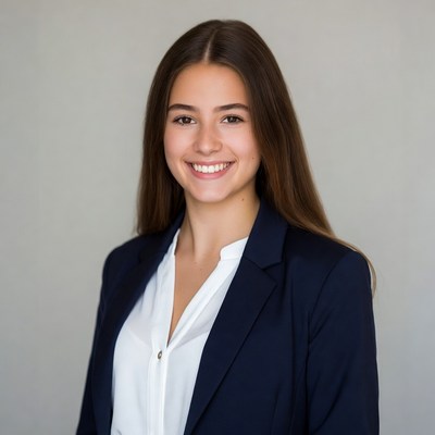 Smiling young woman in navy blazer