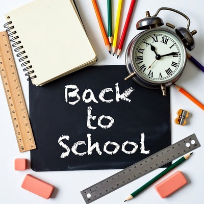 Back to School Supplies on Chalkboard