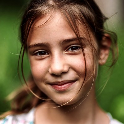 Smiling girl with brown hair