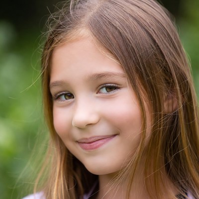 Smiling girl with brown eyes