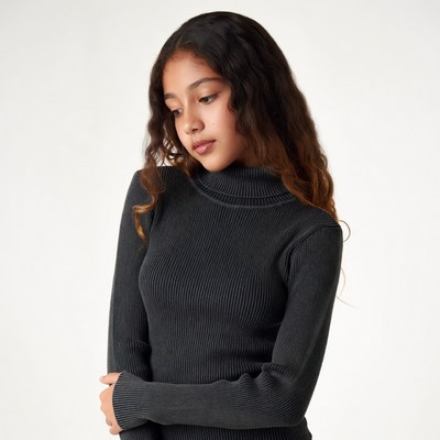 Young woman in gray turtleneck sweater