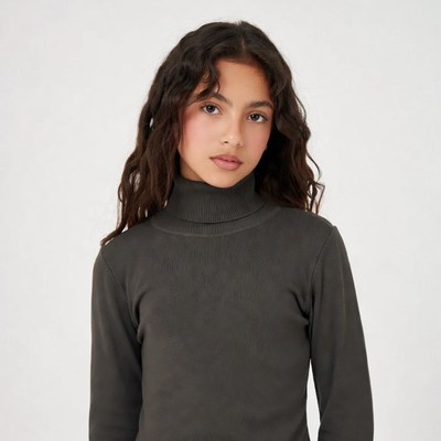 Girl in gray turtleneck sweater