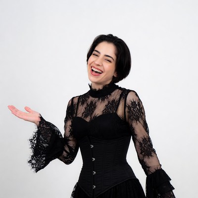 Smiling woman in black lace corset dress