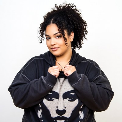 Curly-haired African-American woman in hoodie