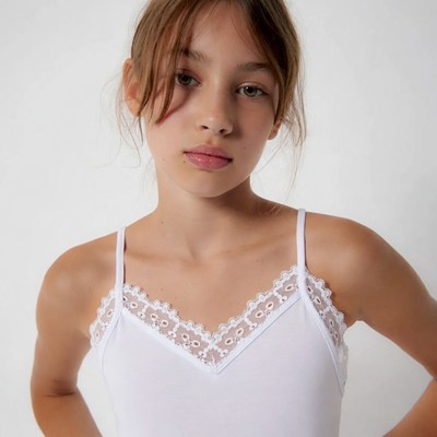 Girl in white lace camisole