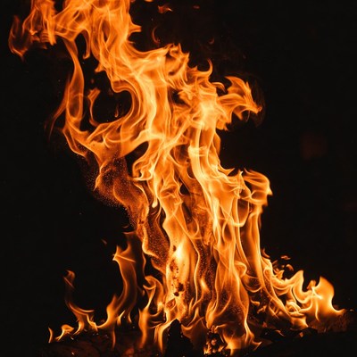 Bright orange flames on black background