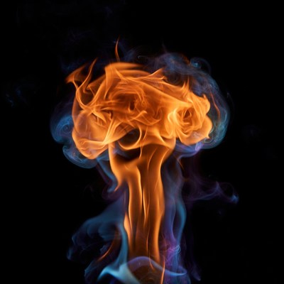 Fiery Orange Explosion with Blue Smoke