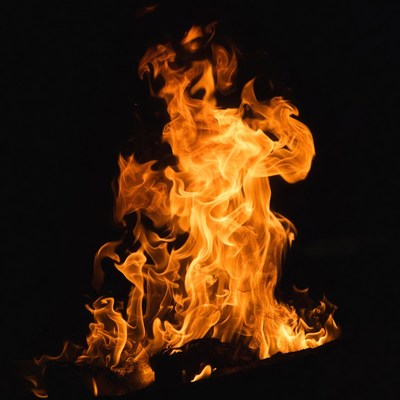 Vibrant flames burning on black background