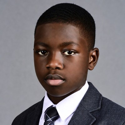 African boy in suit portrait