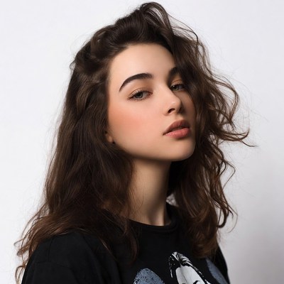 Young woman with wavy brown hair