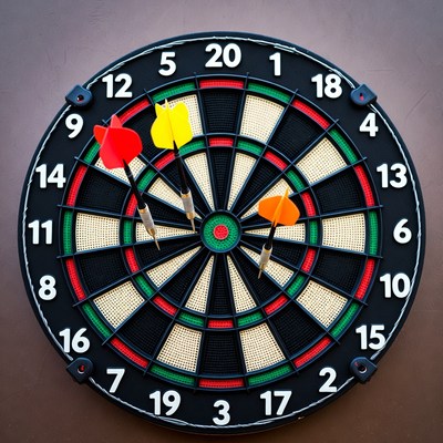 Dartboard with colorful darts