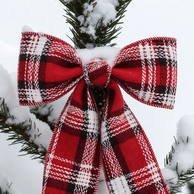 Red Plaid Bow on Snowy Christmas Tree