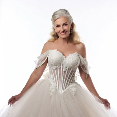 Elegant mature woman in white wedding gown