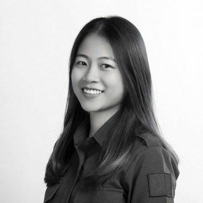 Asian woman smiling in uniform