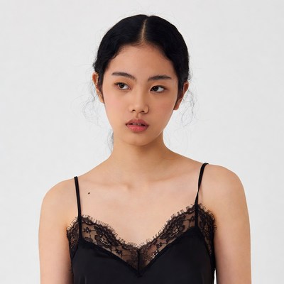Asian woman in black lace slip