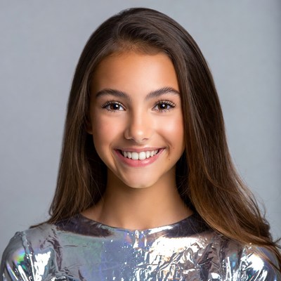 Smiling girl in silver top