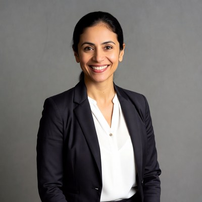 Smiling Indian woman in business suit