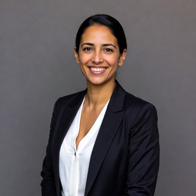 Smiling woman in black blazer