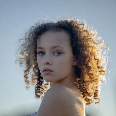 Young woman with curly hair