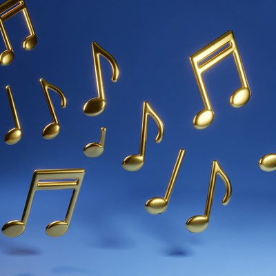Golden musical notes floating on blue
