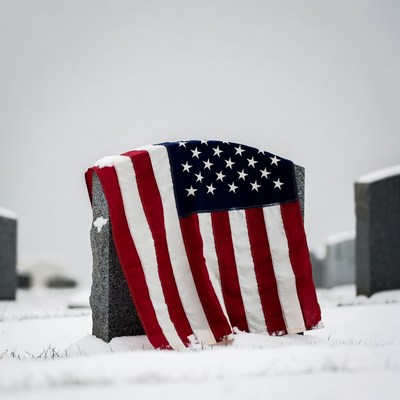 American Flag on Snowy Grave