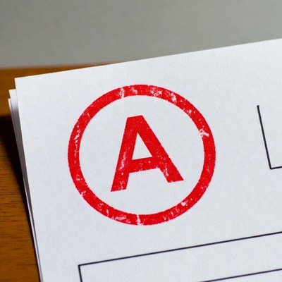 Red A Grade Stamp on Paper