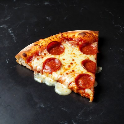 Pepperoni Pizza Slice on Black Surface