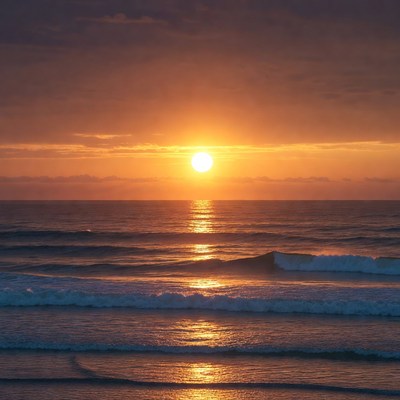 Sunset over ocean waves