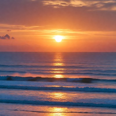 Sunset over ocean waves