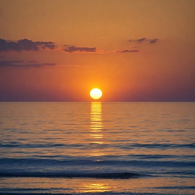 Sunset over calm ocean