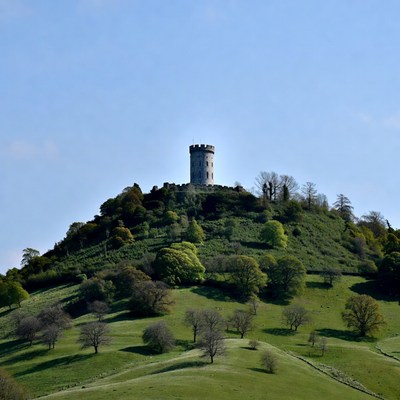 Tower atop green hill