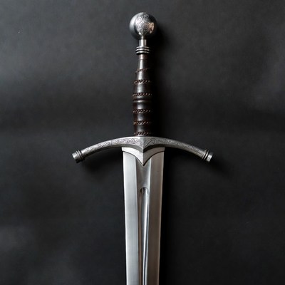 Medieval longsword on black background