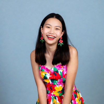 Asian girl smiling in floral dress