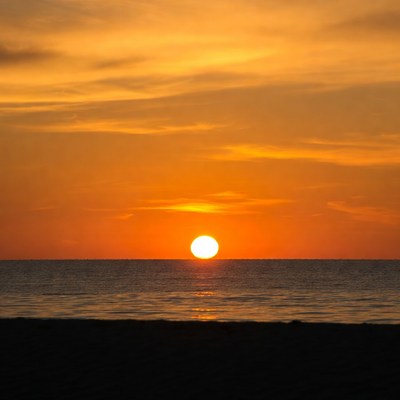 Sunset over ocean beach