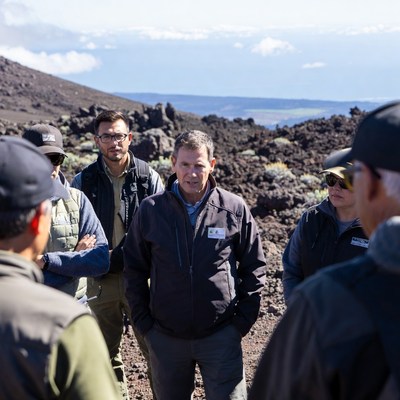Group of men on volcano summit