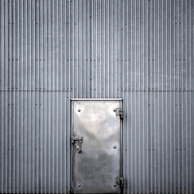 Metal Door on Corrugated Wall